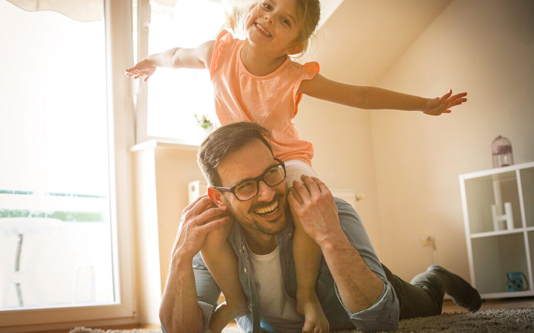 Father and daughter spending time at home