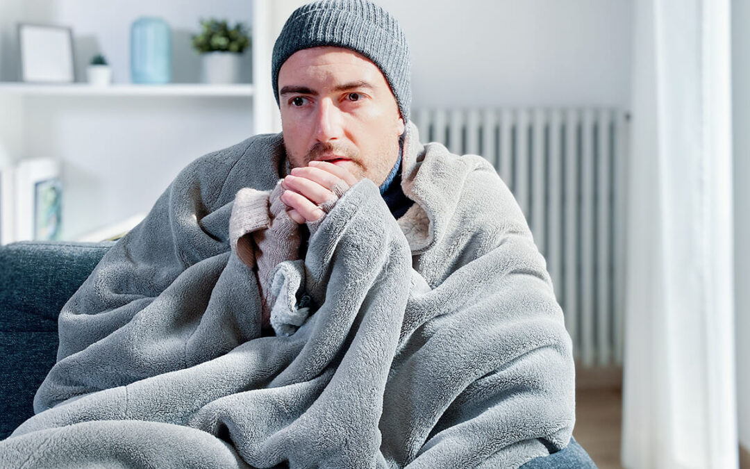 Man suffering cold at home